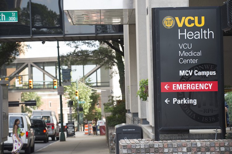 VCU Sign and people