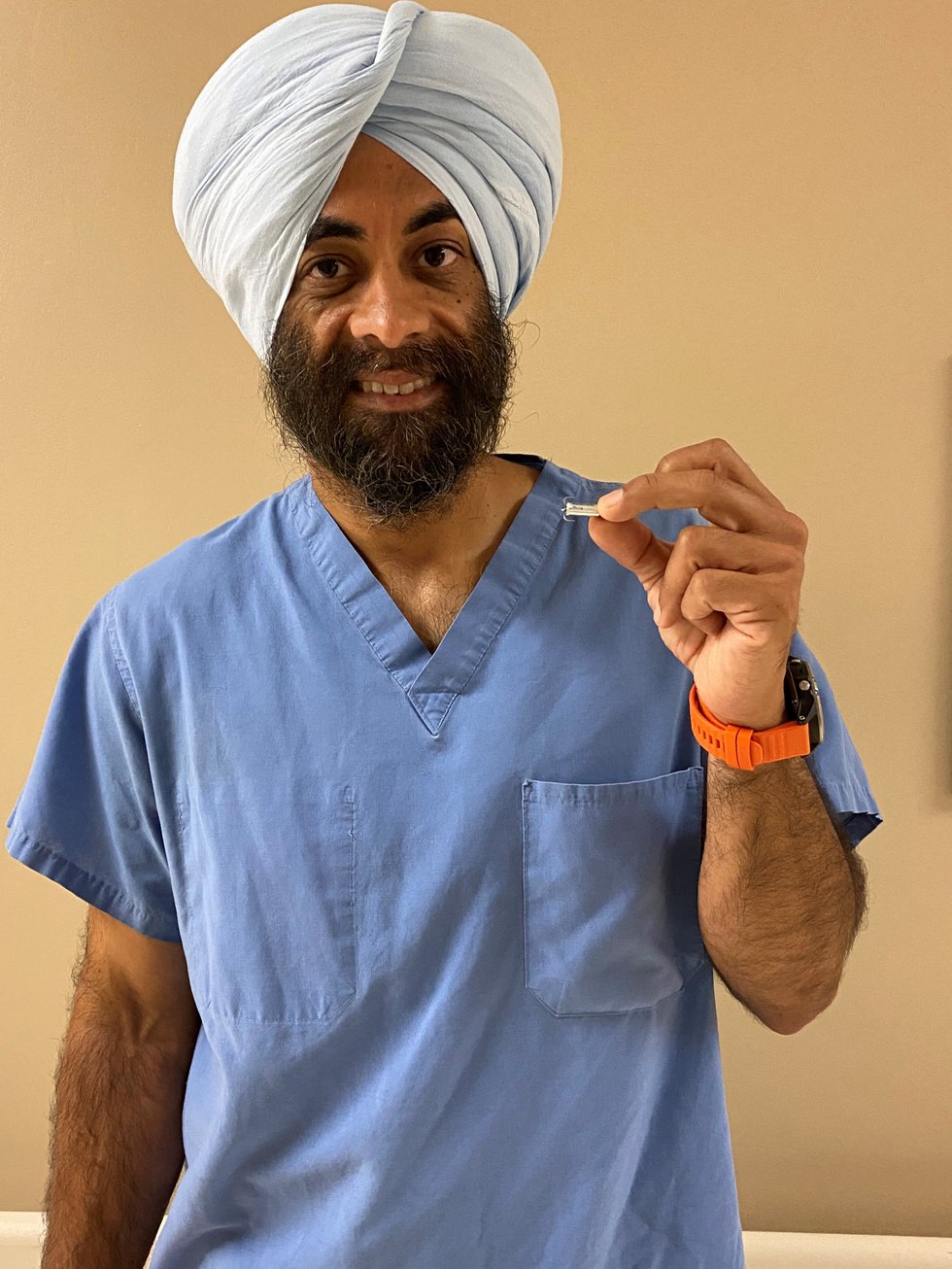 Dr. Harpreet Grewal with the Micra AV device